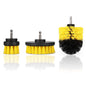 Three yellow and black drill brush attachments with metal shafts, including small round, large round, and rounded brushes.