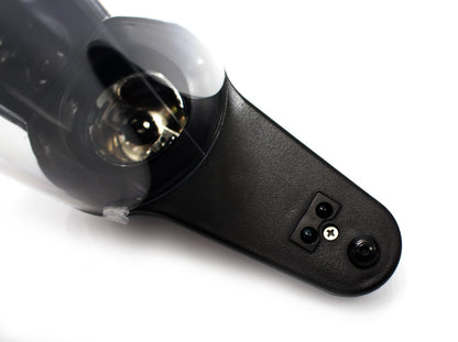  Underside of the soap dispenser’s spout showing the sensor components and liquid outlet.
