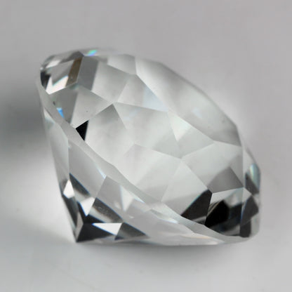 Clear acrylic diamond gems in a 2 lb bag for wedding and party decoration
