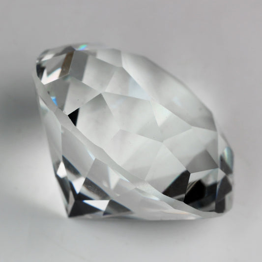 Clear acrylic diamond gems in a 2 lb bag for wedding and party decoration
