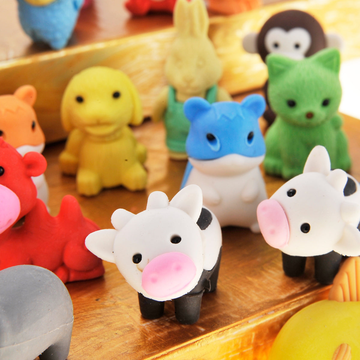 Novelty animal pencil erasers in colorful puzzle designs